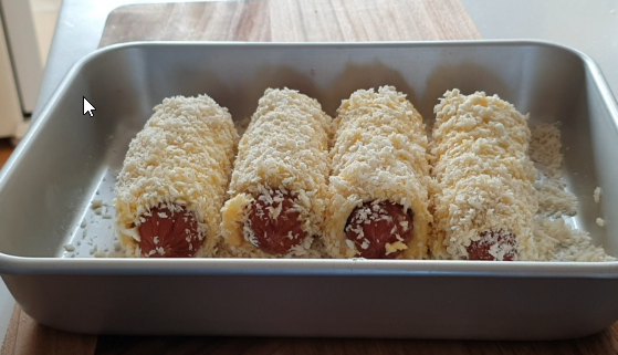 Frying Korean corn dogs in oil until golden brown